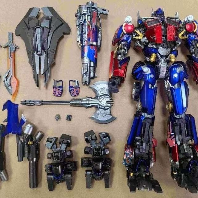 MC003 A B Movie 2 Optimus Prime DLX immutable alloy finish